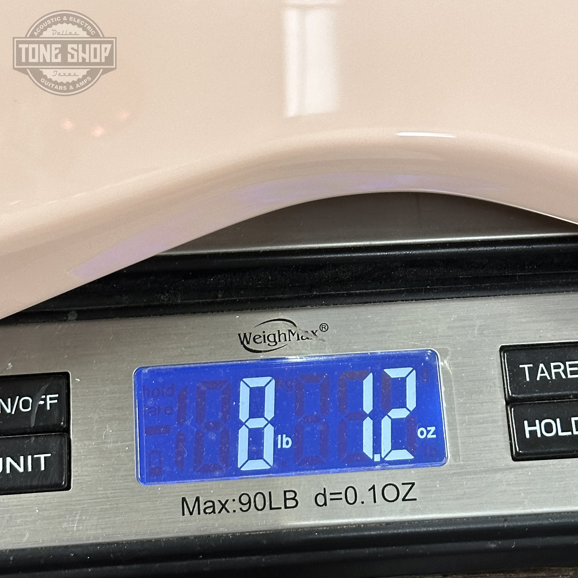 Weight of Jackson Custom Shop DK 2H FR Shell Pink XN010524.