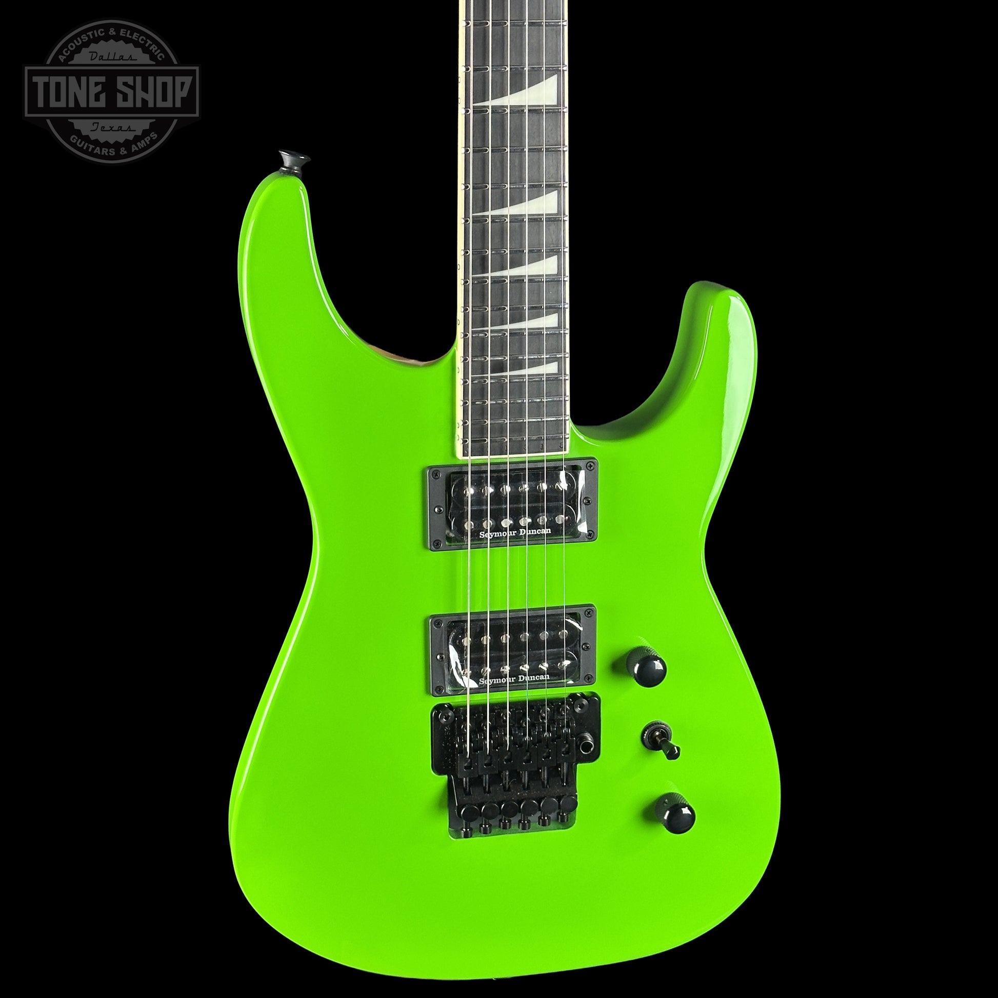 Front left angle of Jackson Custom Shop TSG Illuminati SL2H FR  Kawasabi Green.