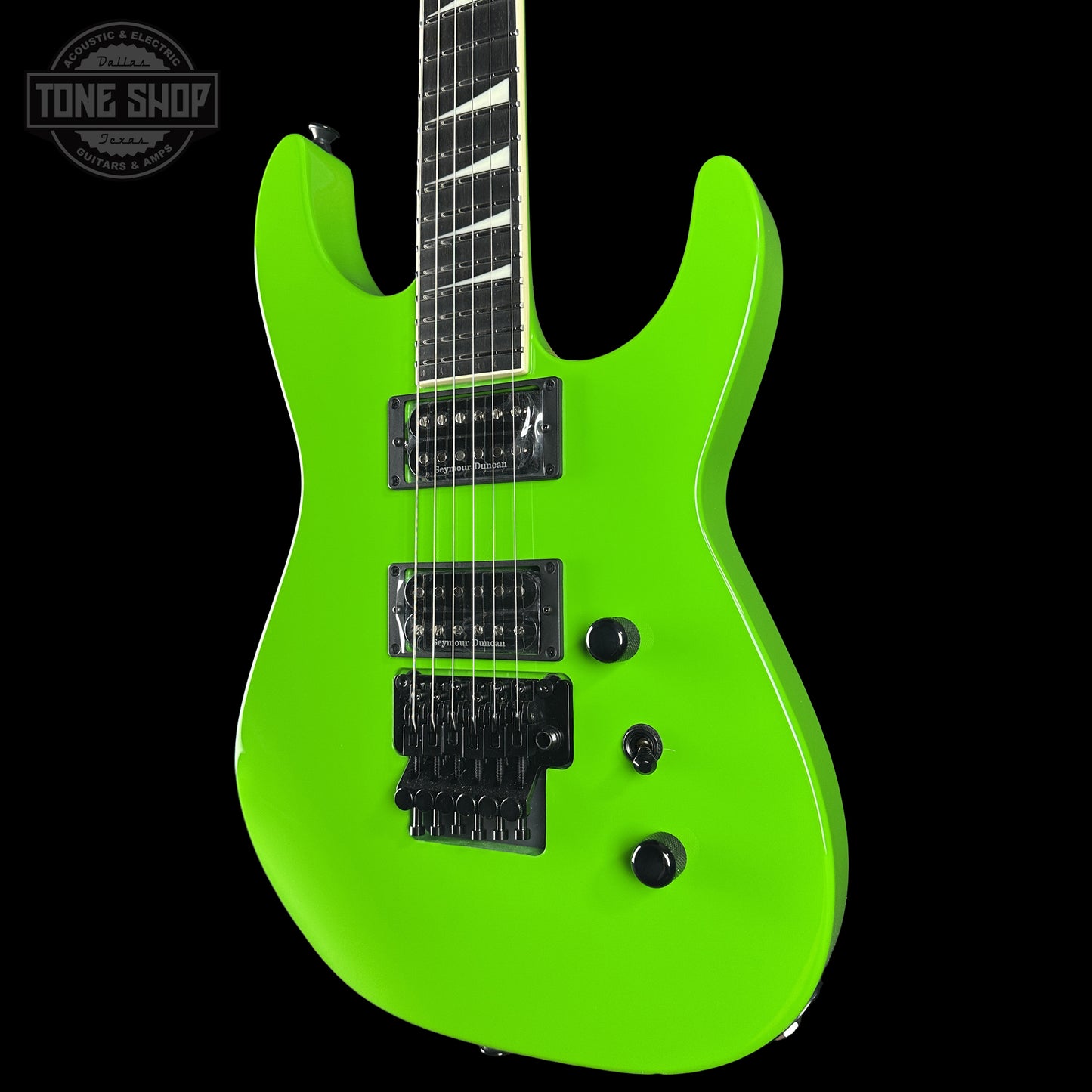 Front right angle of Jackson Custom Shop TSG Illuminati SL2H FR  Kawasabi Green.