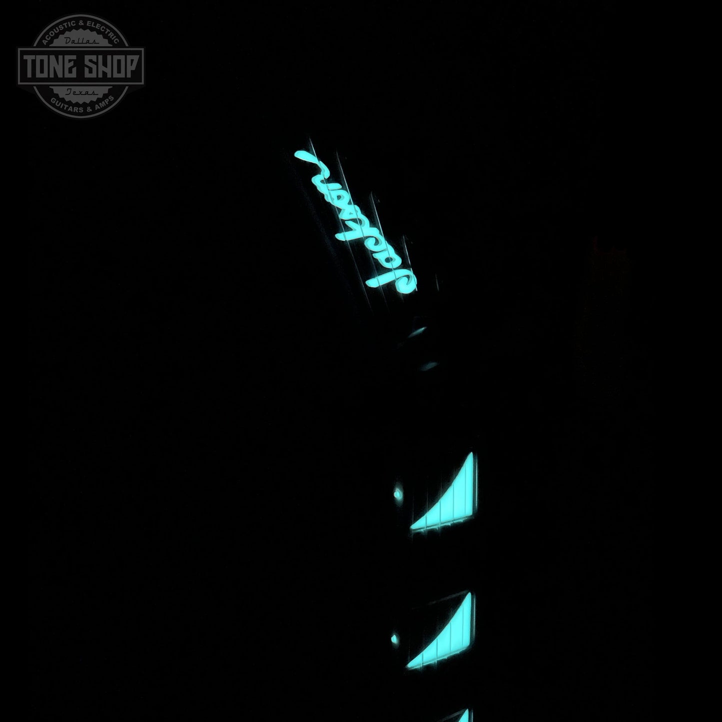 Right angle of glow in the dark neck of Jackson Custom Shop TSG Illuminati SL2H FR  Neon Pink J11328.