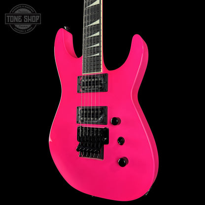 Front right angle of Jackson Custom Shop TSG Illuminati SL2H FR  Neon Pink J11328.