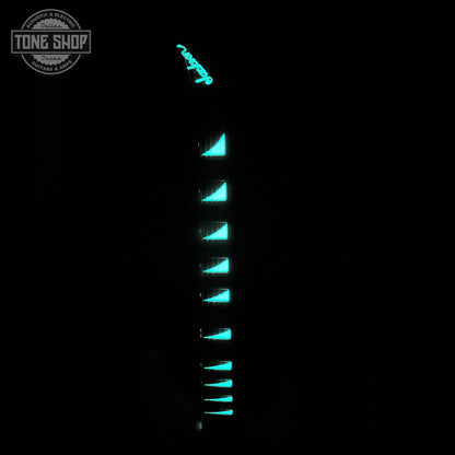Front of neck and headstock glowing in the dark of Jackson Custom Shop TSG Illuminati SL2H FR Vanilla Shake wcase J11274.