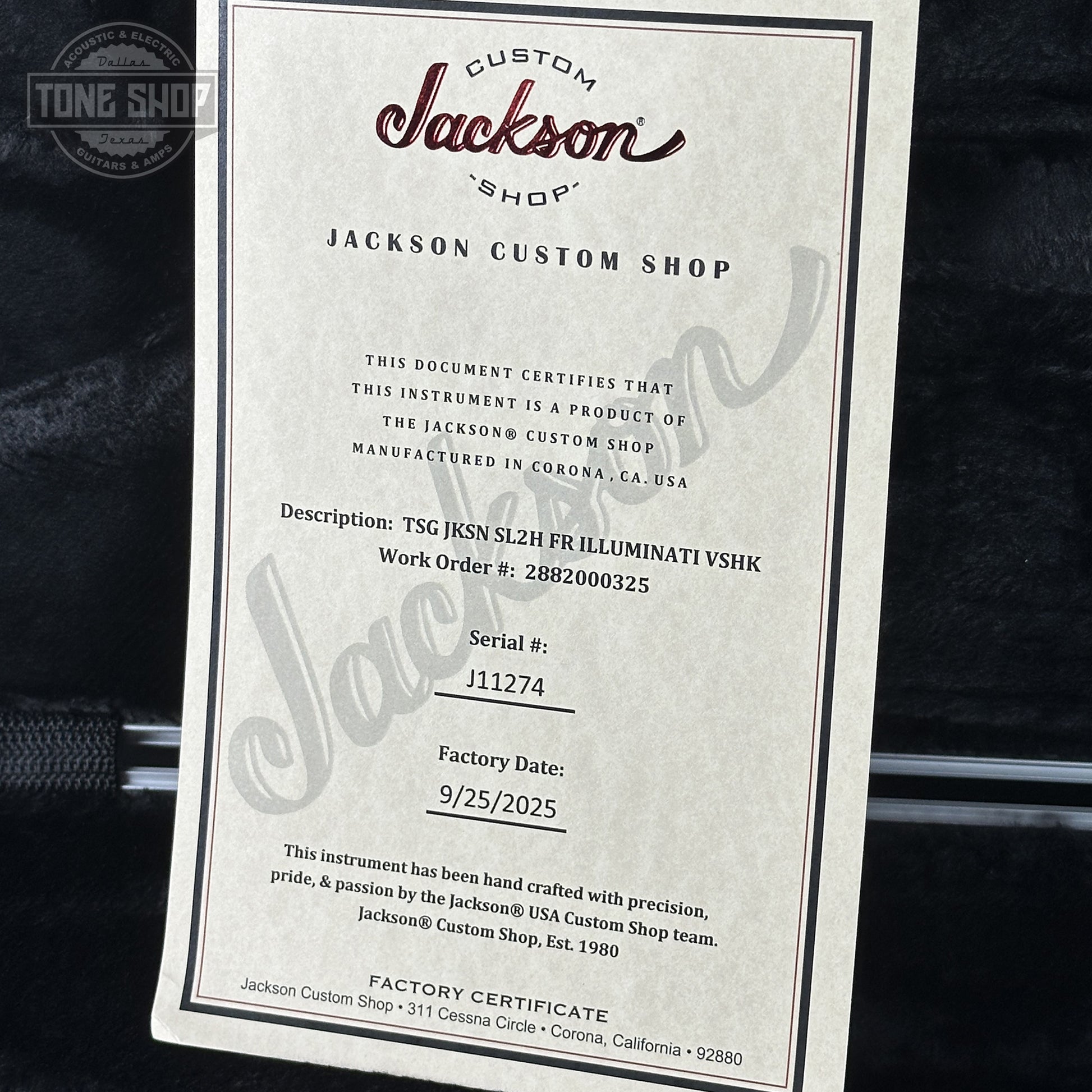 Jackson Custom Shop certificate on a guitar, with 'Tone Shop' branding.