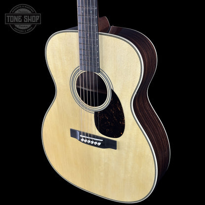 Front right angle of Martin Custom Shop 000 14-Fret Wild Grain East Indian Rosewood body.