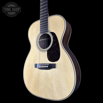 Front right angle of Martin Custom Shop 00 14-Fret Wild Grain East Indian Rosewood.