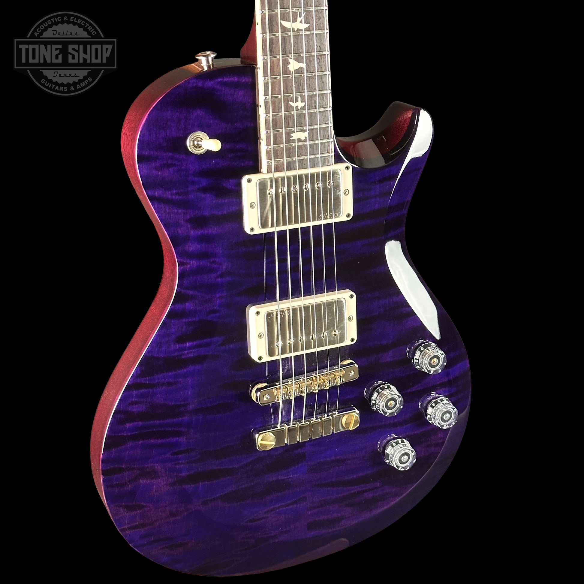 Front left angle of PRS S2 Wood Library McCarty 594 Singlecut Quilt Purple S2083399.