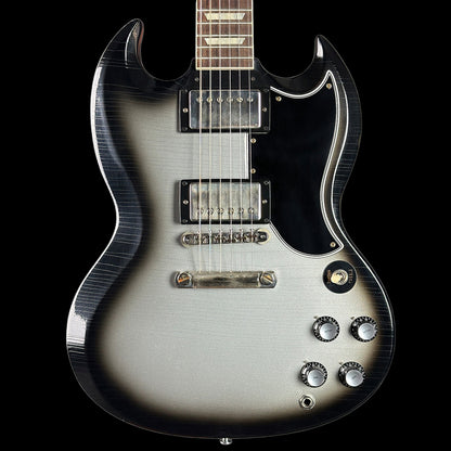 Electric guitar with a black and silver design on a black background