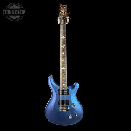 Blue electric guitar on a black background with 'Tone Shop' logo.