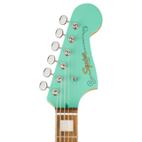 Headstock of Squier Paranormal Baritone Jazzmaster HH Laurel Sea Foam Green.