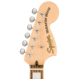 Headstock of Squier Paranormal Troublemaker Telecaster Deluxe Bigsby Laurel Honey Sunburst.
