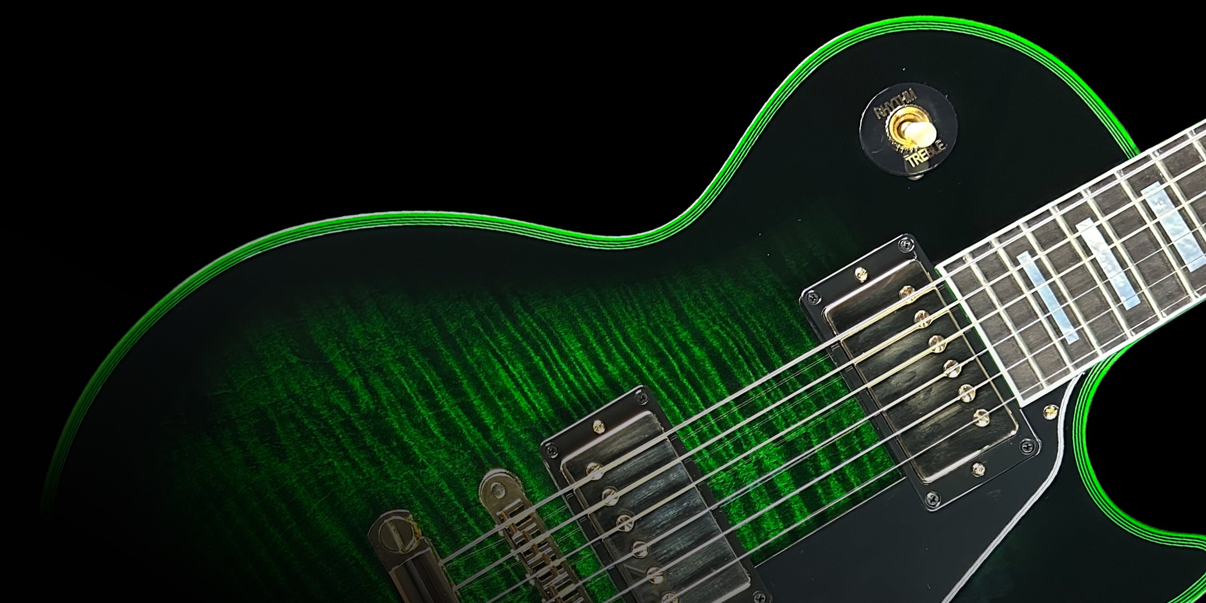 Closeup of green guitar