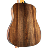 Close-up of a wooden acoustic guitar body on a white background