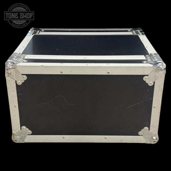 Black flight case with silver trim on a black background, featuring 'Tone Shop' logo.