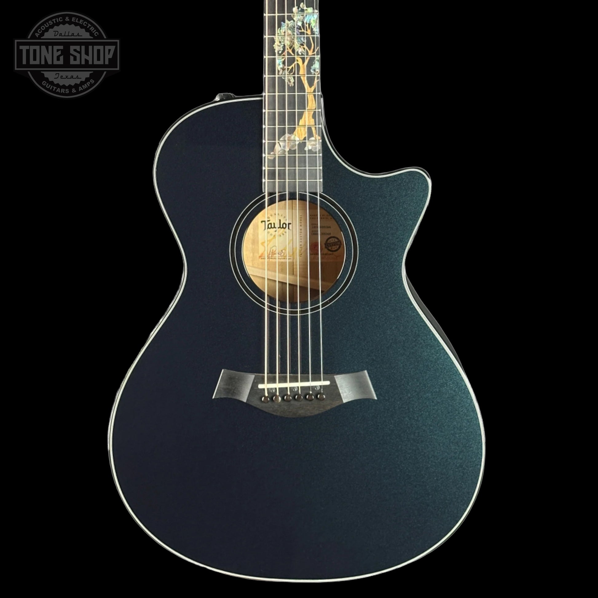 Front of Taylor 2025 Namm Custom #48 Grand Concert Dark Turquoise Metallic.