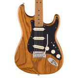 A classic Fender Stratocaster electric guitar with a natural wood grain finish, black pickguard, and cream-colored hardware, shown against a solid white background.