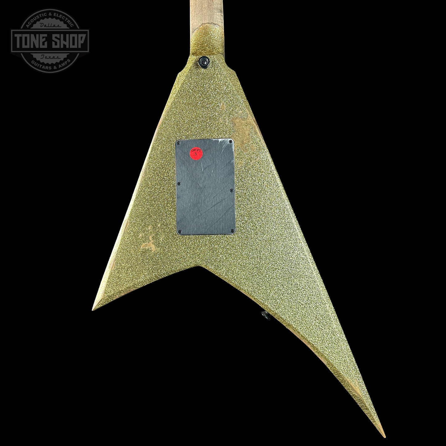 Guitar pickguard with a red dot on a black background, branded 'Tone Shop'.