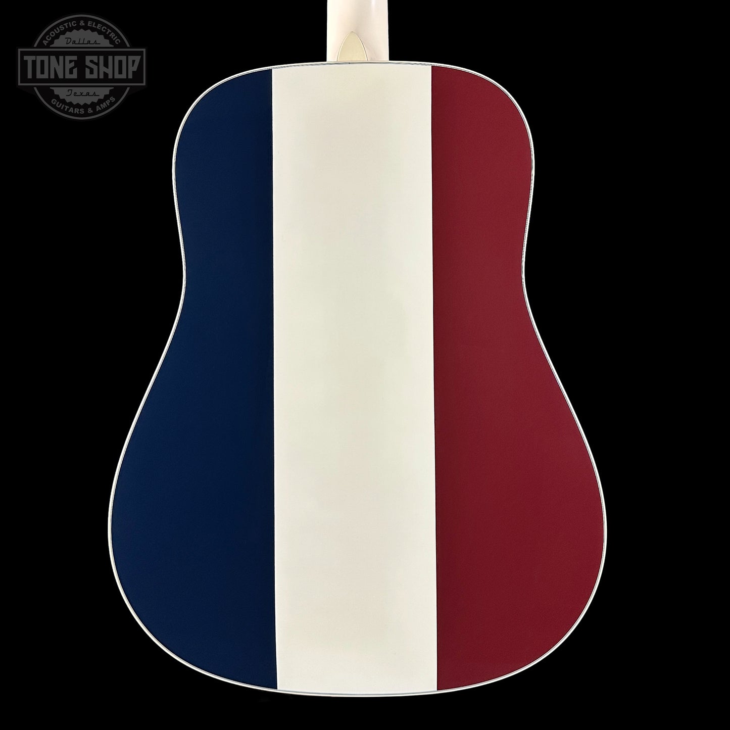 Acoustic guitar with a design featuring blue, white, and red stripes on a black background.