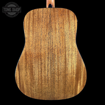 Back view of a wooden acoustic guitar with 'Tone Shop' branding.