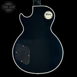 Gibson guitar body with brand logo on a black background