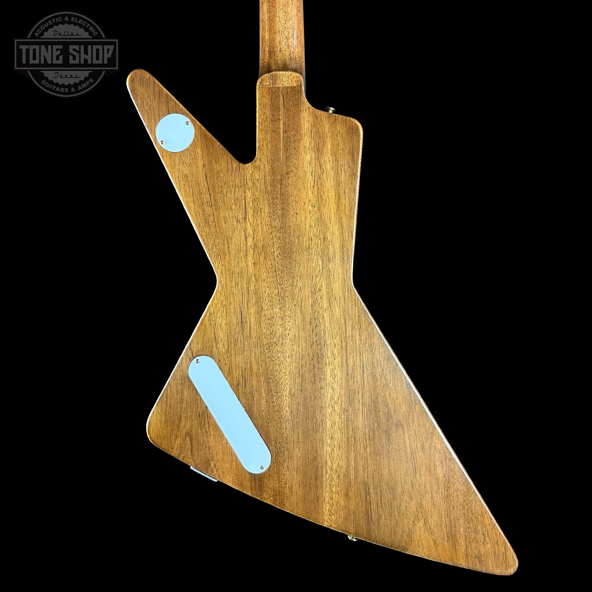 Wooden guitar body with blue inlays on a black background, featuring 'Tone Shop' logo.