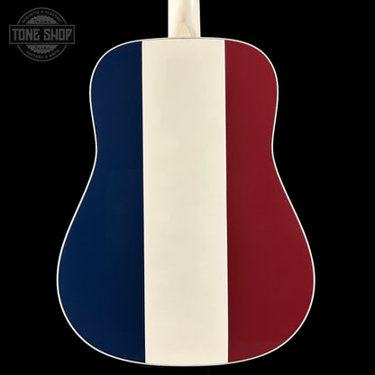 Acoustic guitar with a design featuring blue, white, and red stripes on a black background.