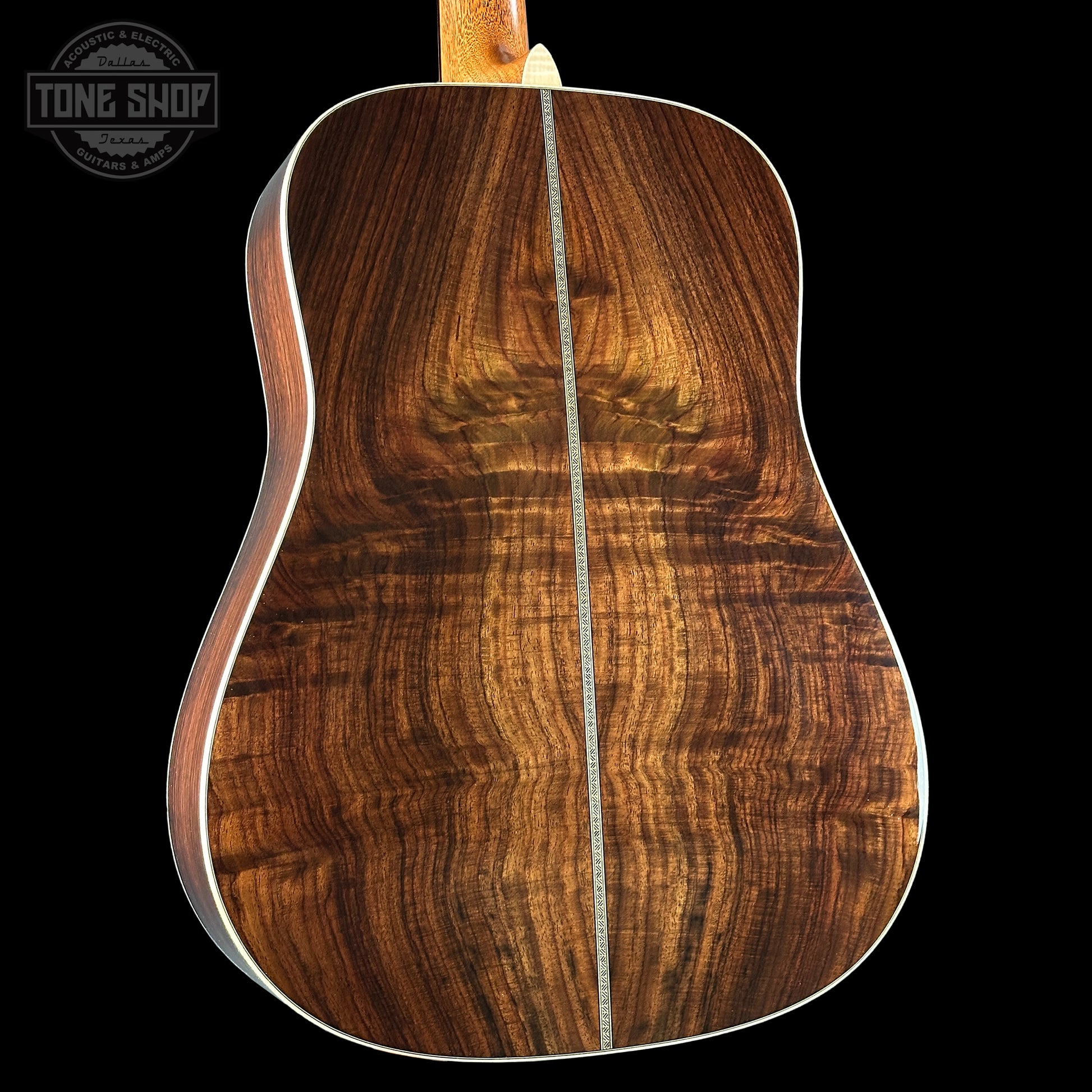 Back angle of Martin Custom Shop Dread 14-Fret Wild Grain East Indian Rosewood.