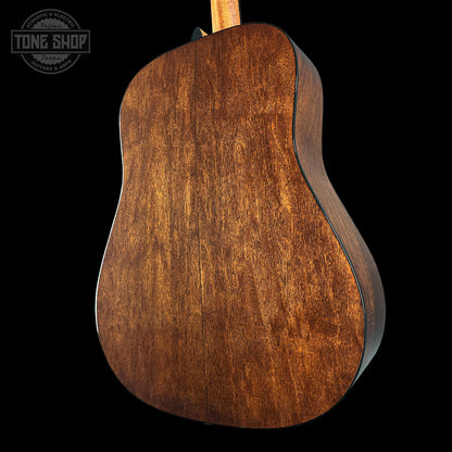 Back view of a wooden acoustic guitar 