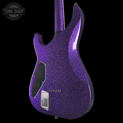 Purple glitter electric guitar on a black background with 'Tone Shop' logo.