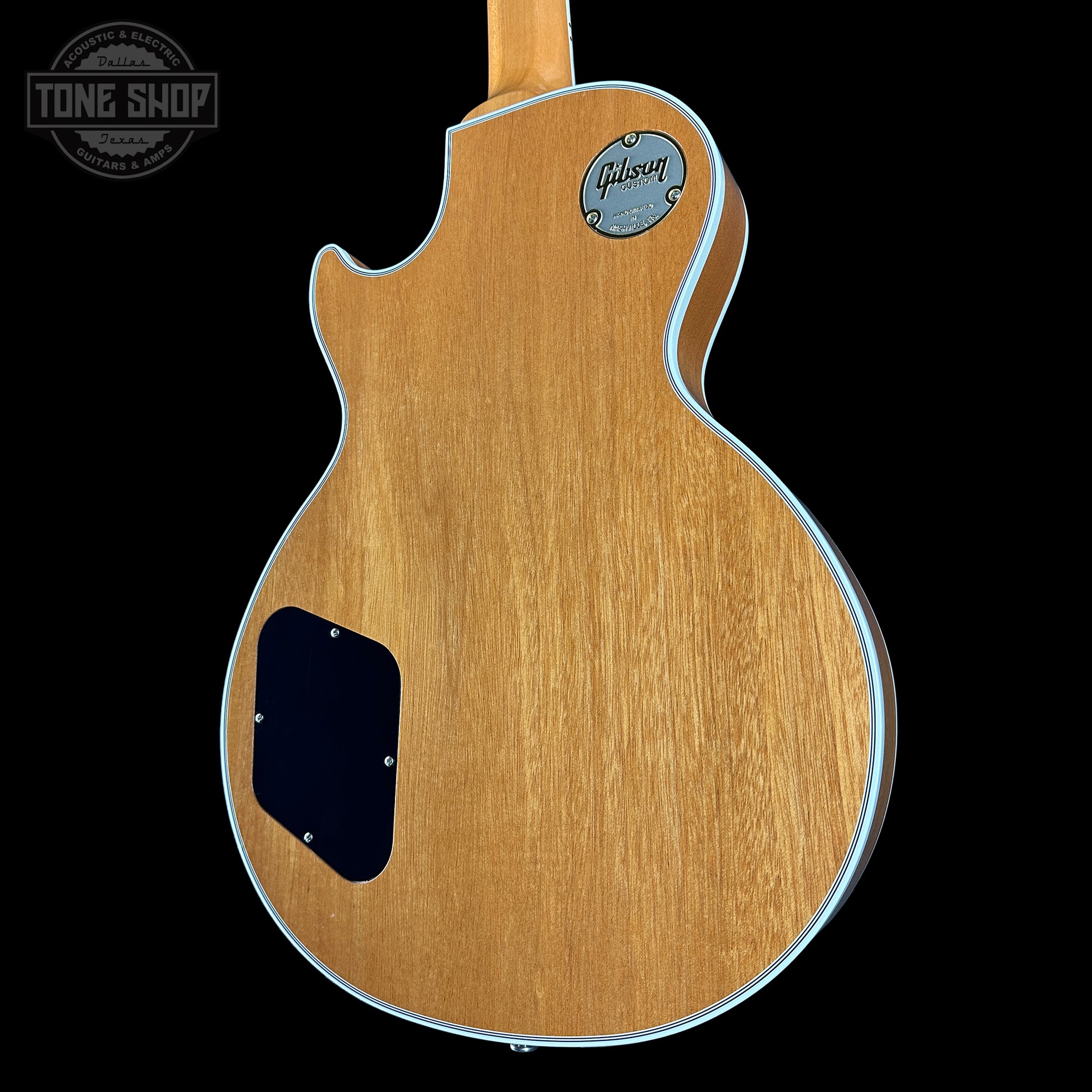 Back angle of Gibson Custom Shop TSG Anniversary Les Paul Custom Chambered 7A Quilt Cobra.