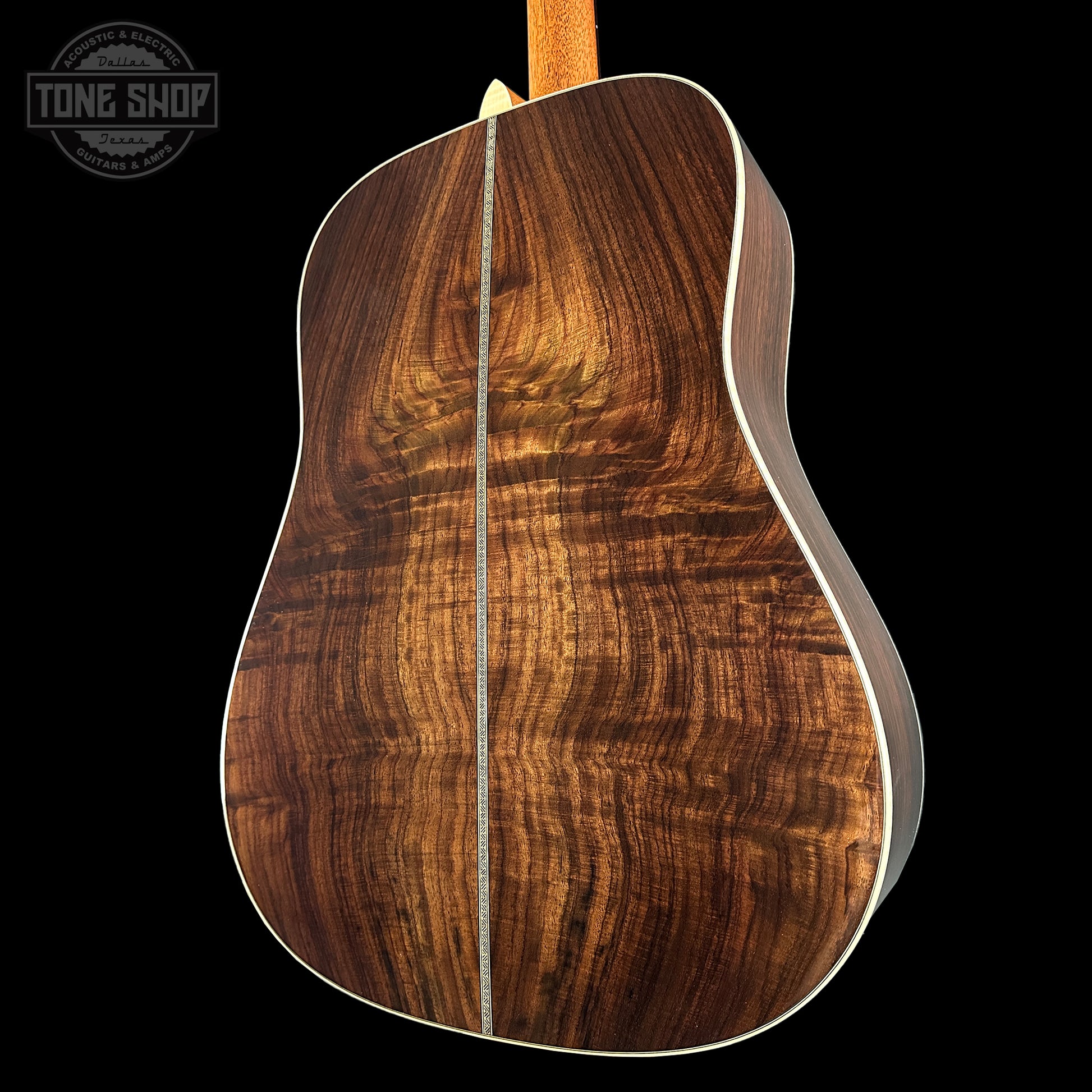Back angle of Martin Custom Shop Dread 14-Fret Wild Grain East Indian Rosewood.
