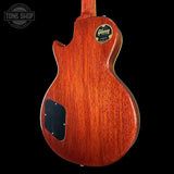 Gibson electric guitar body with brand logo on a black background