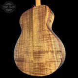 Back angle of Taylor 2025 Namm Custom #40 Grand Concert AA Koa.