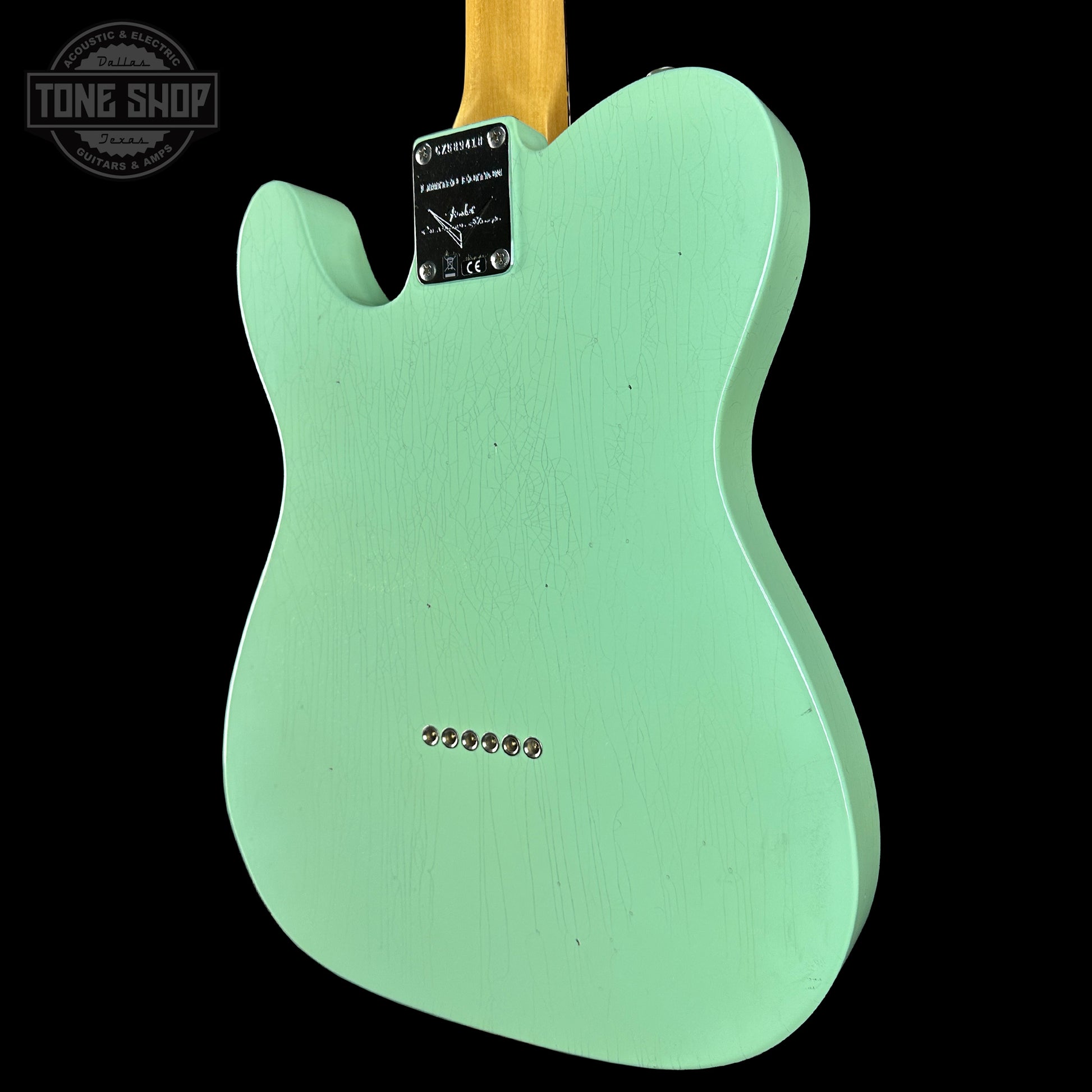 Back angle of Fender Custom Shop 1963 Telecaster Journeyman Relic Aged Surf Green.