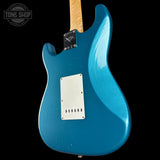 Back angle of Fender Custom Shop 1963 Stratocaster Journeyman Relic Ocean Turquoise AAA Maple Neck.