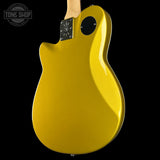 Gold electric guitar on a black background with 'Tone Shop' logo.
