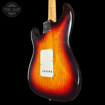 Electric guitar with a sunburst finish on a black background, featuring the Tone Shop logo.
