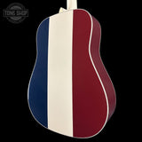Acoustic guitar with a red, white, and blue striped design on a black background