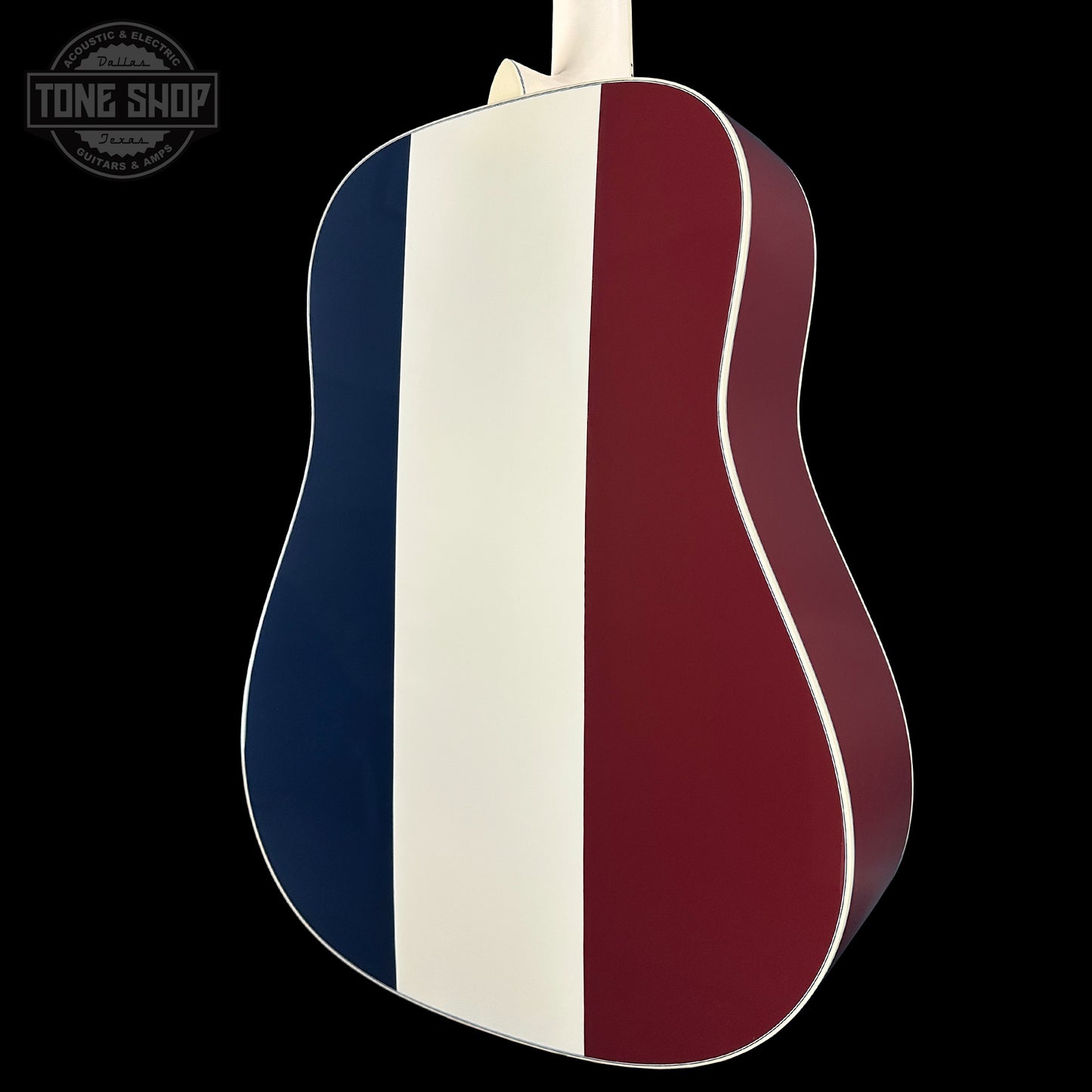 Acoustic guitar with a design featuring blue, white, and red stripes on a black background.