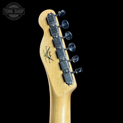 Back of headstock of Fender Custom Shop 1963 Telecaster Journeyman Relic Aged Surf Green.