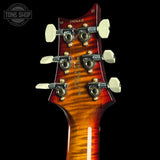 Back of headstock of PRS Wood Library Custom 24 Quilt 10 Top Dark Cherry Sunburst.