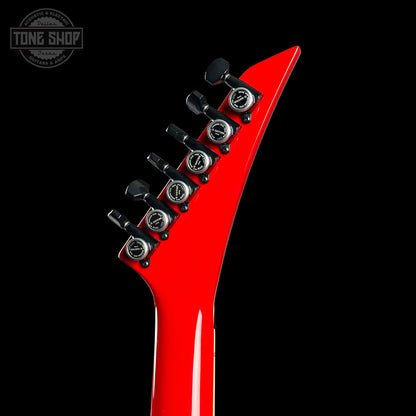Red electric guitar neck with tuning pegs on a black background, featuring 'Tone Shop' logo.