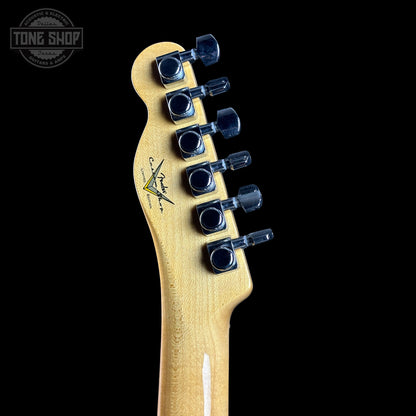 Guitar headstock with tuning pegs on a black background, featuring the Tone Shop logo.