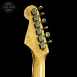 Guitar headstock with tuning pegs on a black background, featuring the Tone Shop logo.