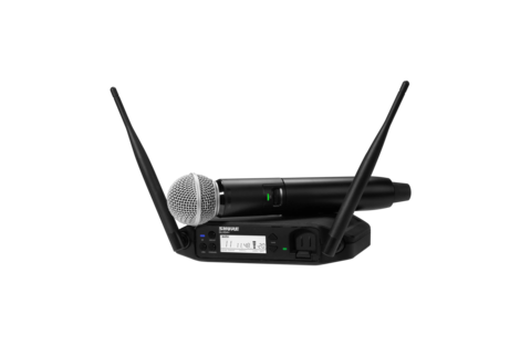 Front of Shure  GLXD24+/SM58 Digital Wireless Handheld Microphone System with SM58 with mic resting on top.