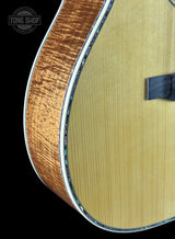 Front angle of Martin Custom Shop OM 45 Style Adirondack/Exceptional Broad Figure Koa.