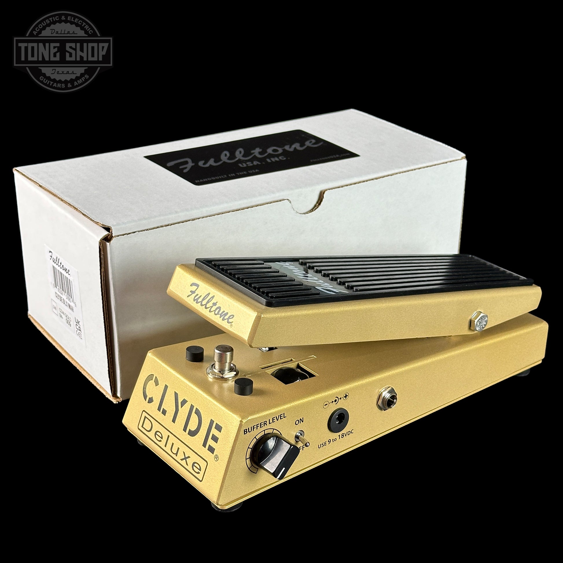 Gold Clyde Deluxe guitar pedal with white box in the background, featuring Fulltone branding.