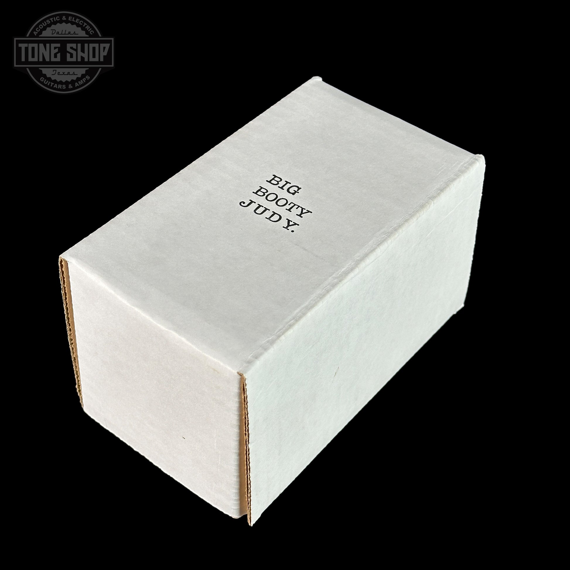 White box with 'BIG BOOTYJUDY' text on a black background