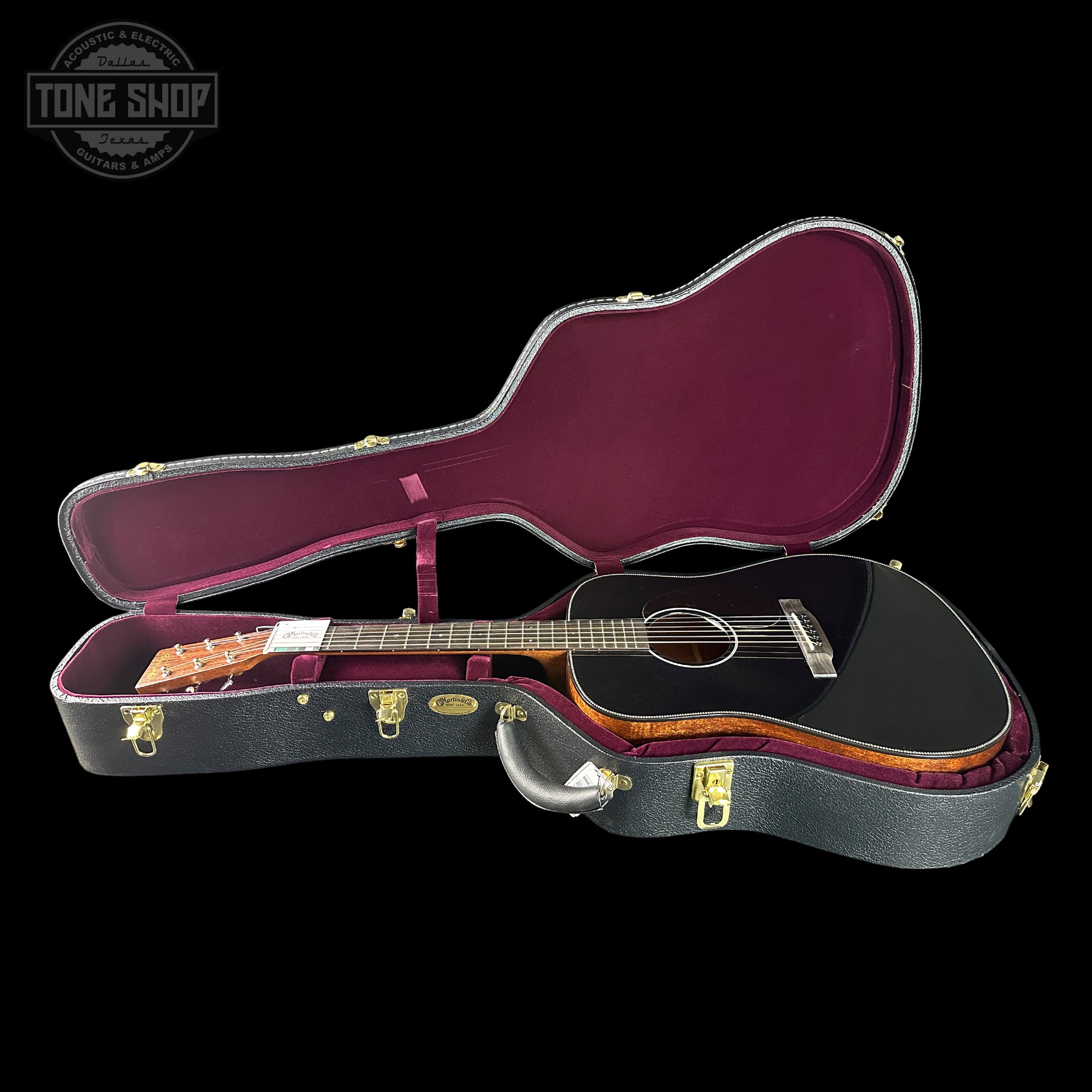 Acoustic guitar in an open case