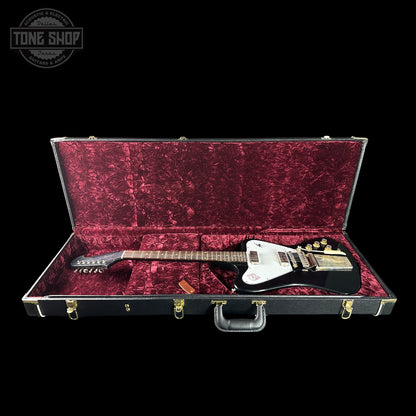 Guitar in a red-lined case