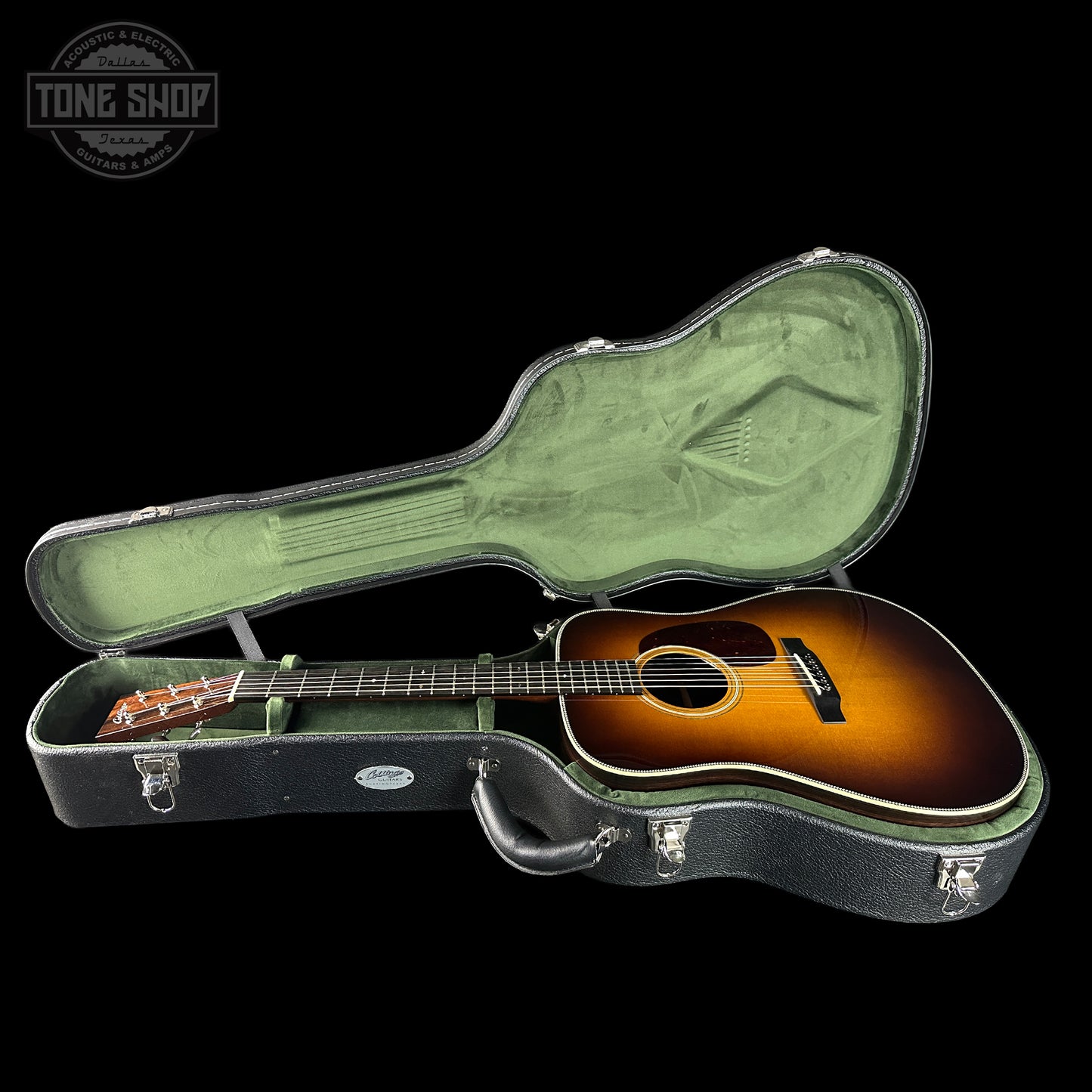 Acoustic guitar in a hard-shell case